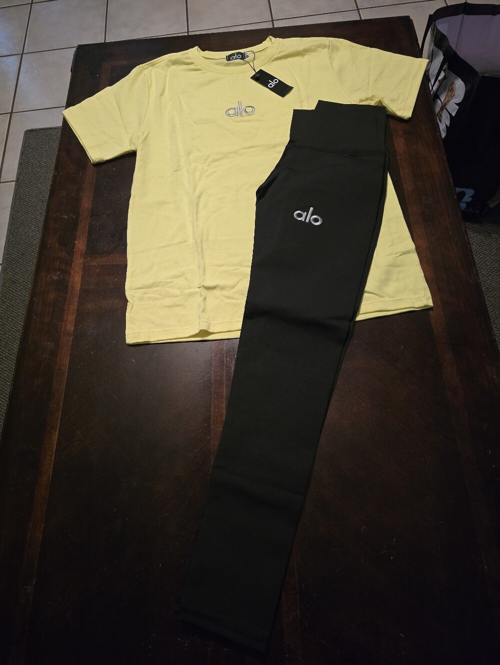 ALO Black High-Rise Leggings with Yellow Tee Styled Set